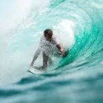 The Best Surf Spots Around the World 4 A surfer inside of a wave