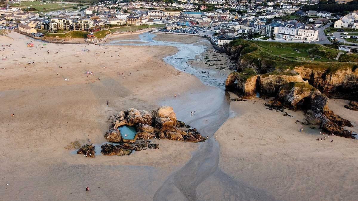 An aerial shot of Perranporth town and beach