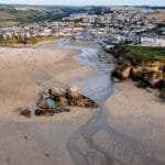 An aerial shot of Perranporth town and beach