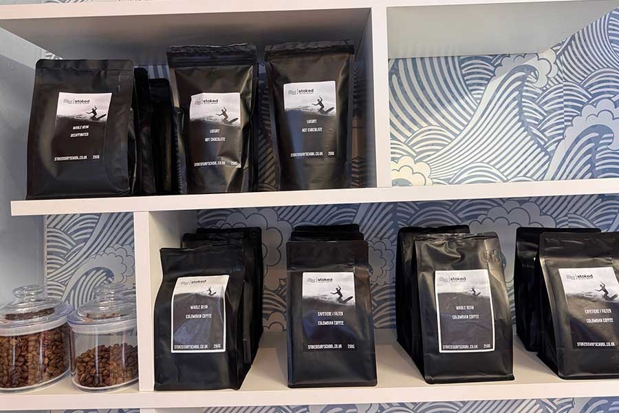 Bags of coffee beans in Stoked's new coffee corner