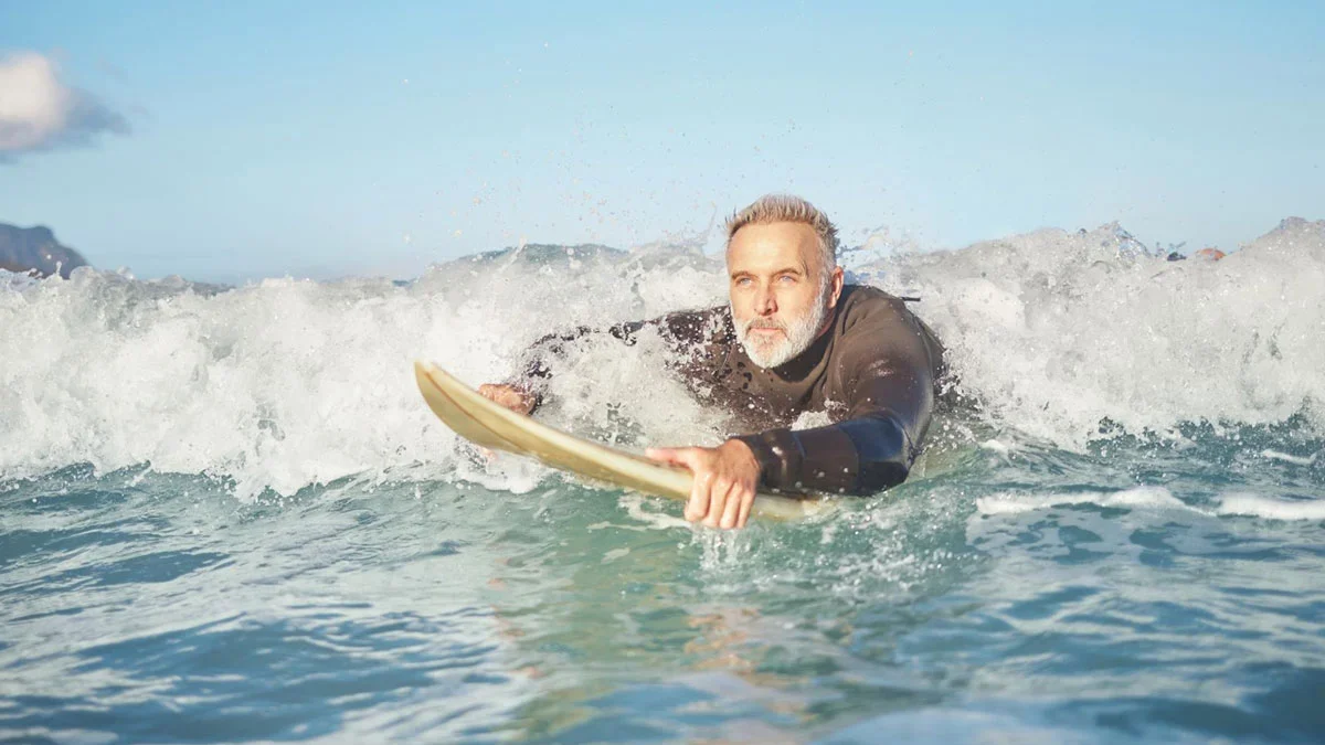 Easter 2026 Offers and more at Stoked Surf School 4 A man surfing at Easter with Stoked Surf School