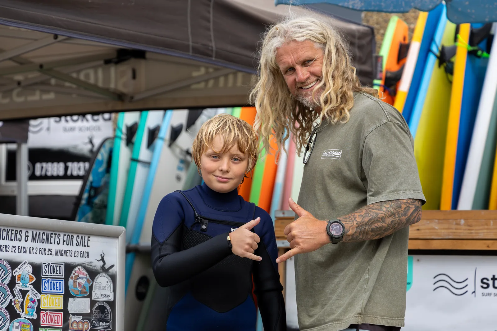 Surfboards on the racks at the Stoked Surf School hire shed in Perranporth